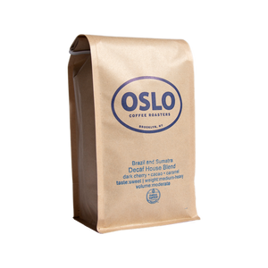 Side view of a Braszil and Sumatra Decaf house blend bag featuring Oslo Coffee Roasters logo and coffee product information