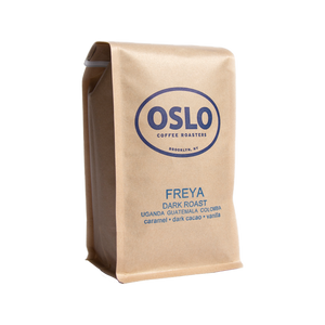 Side view of a Freya dark roast coffee bag featuring Oslo Coffee Roasters logo and coffee product information